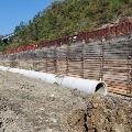 The railroad required support of their property and tracks, so ALCOSAN installed a temporary wall during construction
