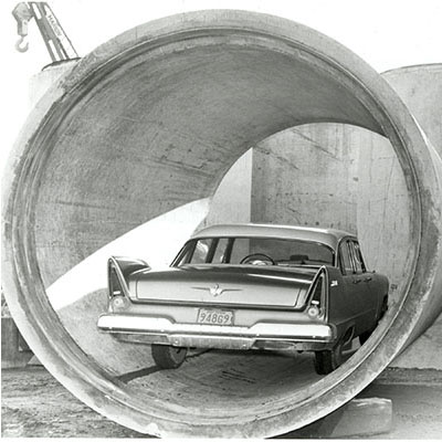 a Car is shown in one of the sewer pipes prior to installation 