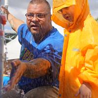 ALCOSAN Open House - Child in Poncho