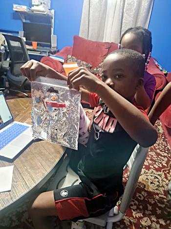A preschooler displaying STEM activity